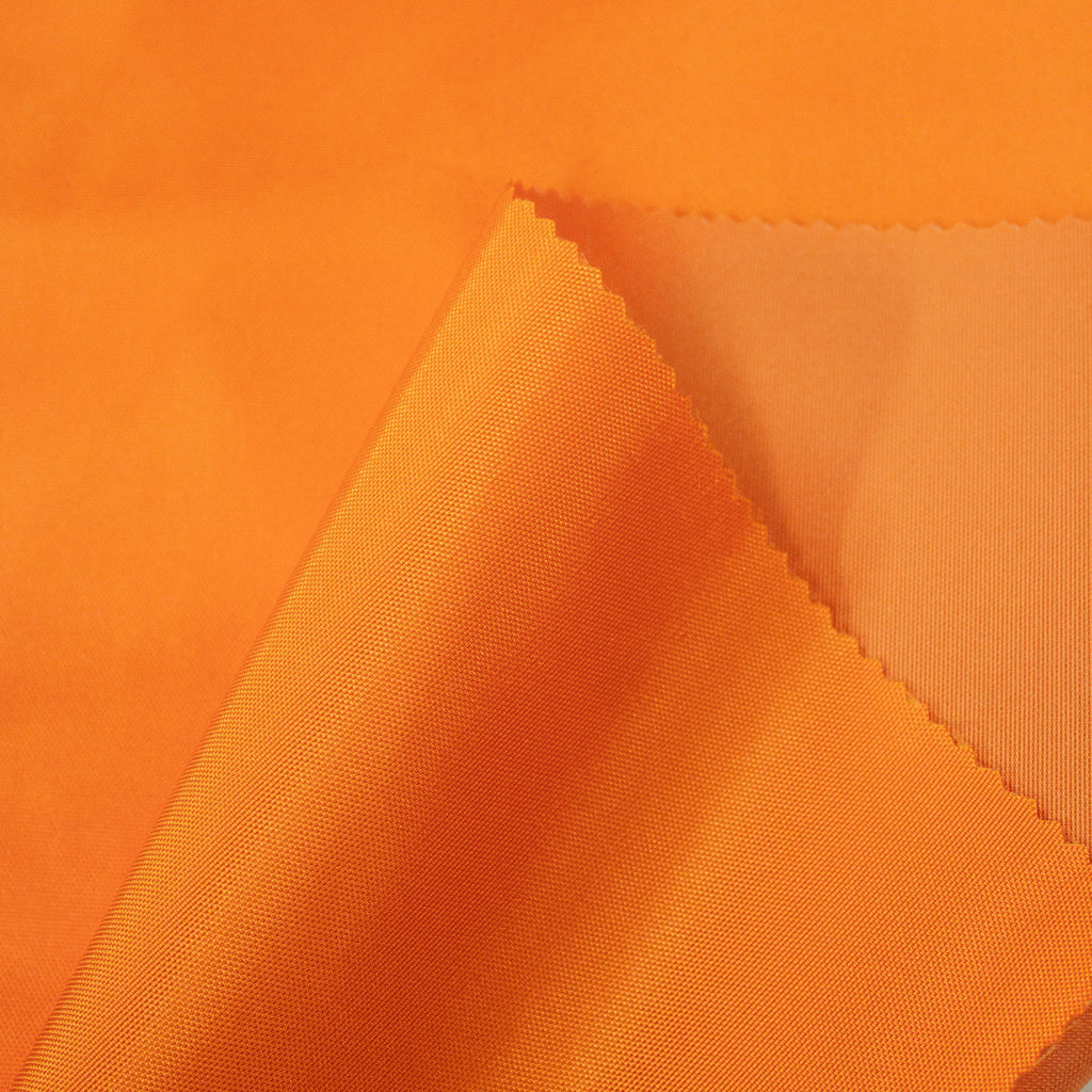 Orange Technical Polyester Fabric | THE FABRIC SALES