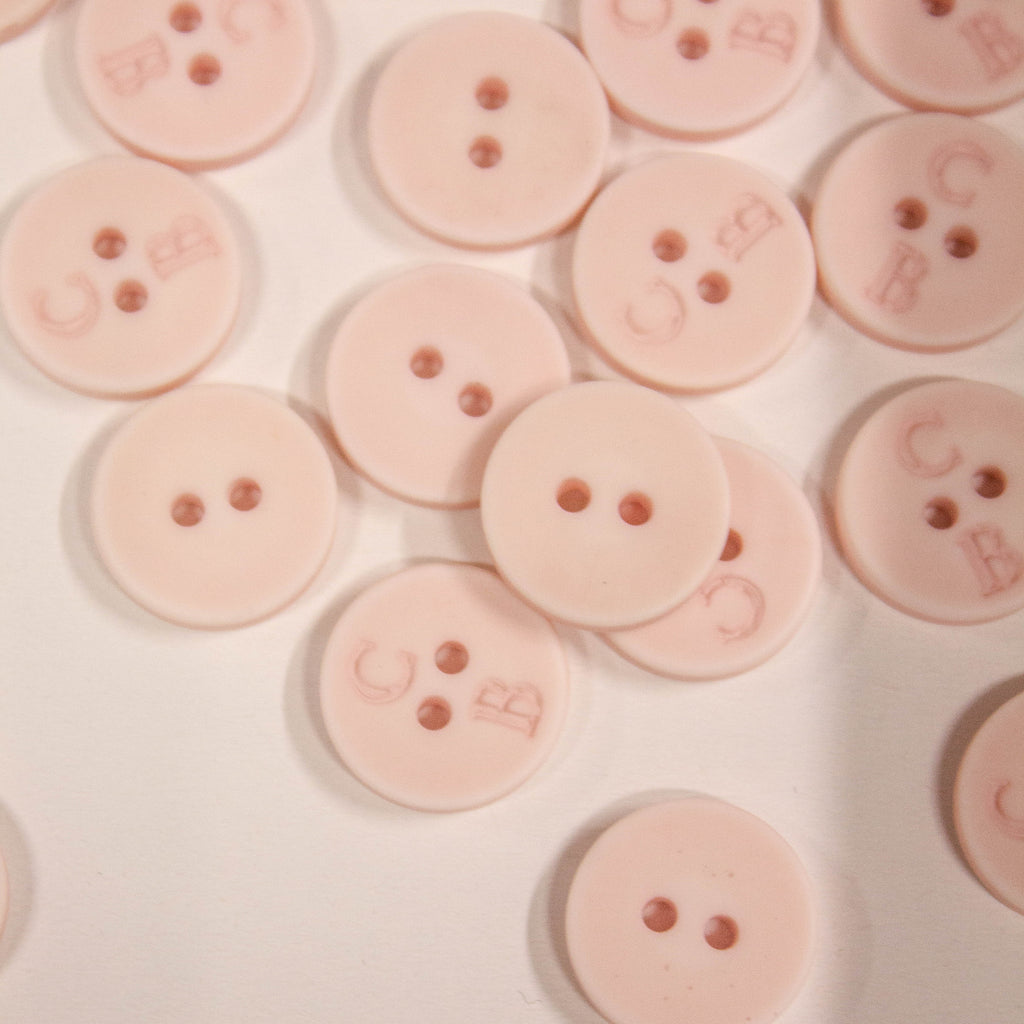 Light Pink Plastic 2-Hole Button 15mm
